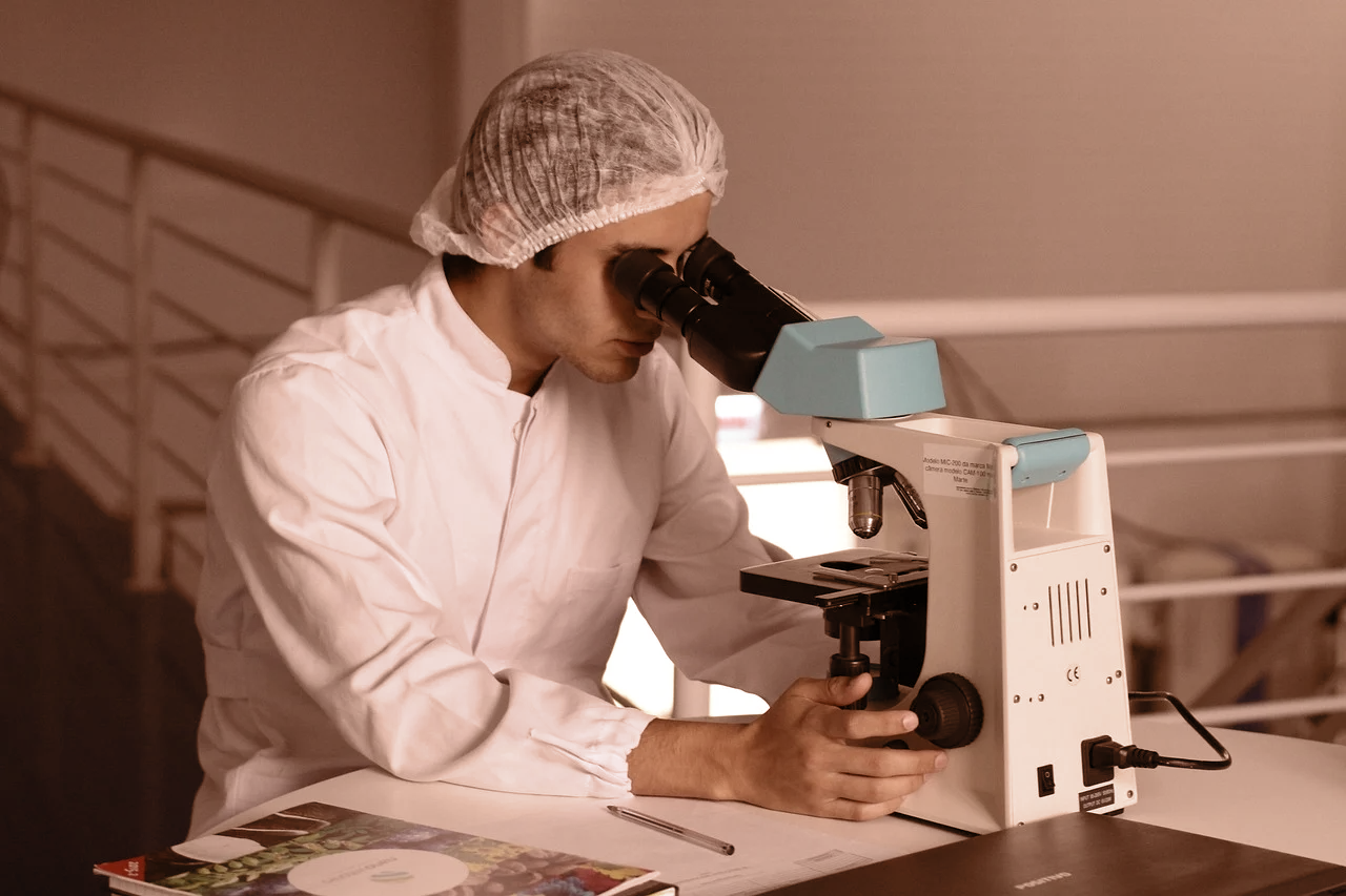 Aroxima formulation and quality specialists collaborating inside the lab.